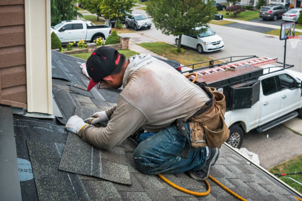 Professional Roof Replacement technician working in Pequabuck, CT
